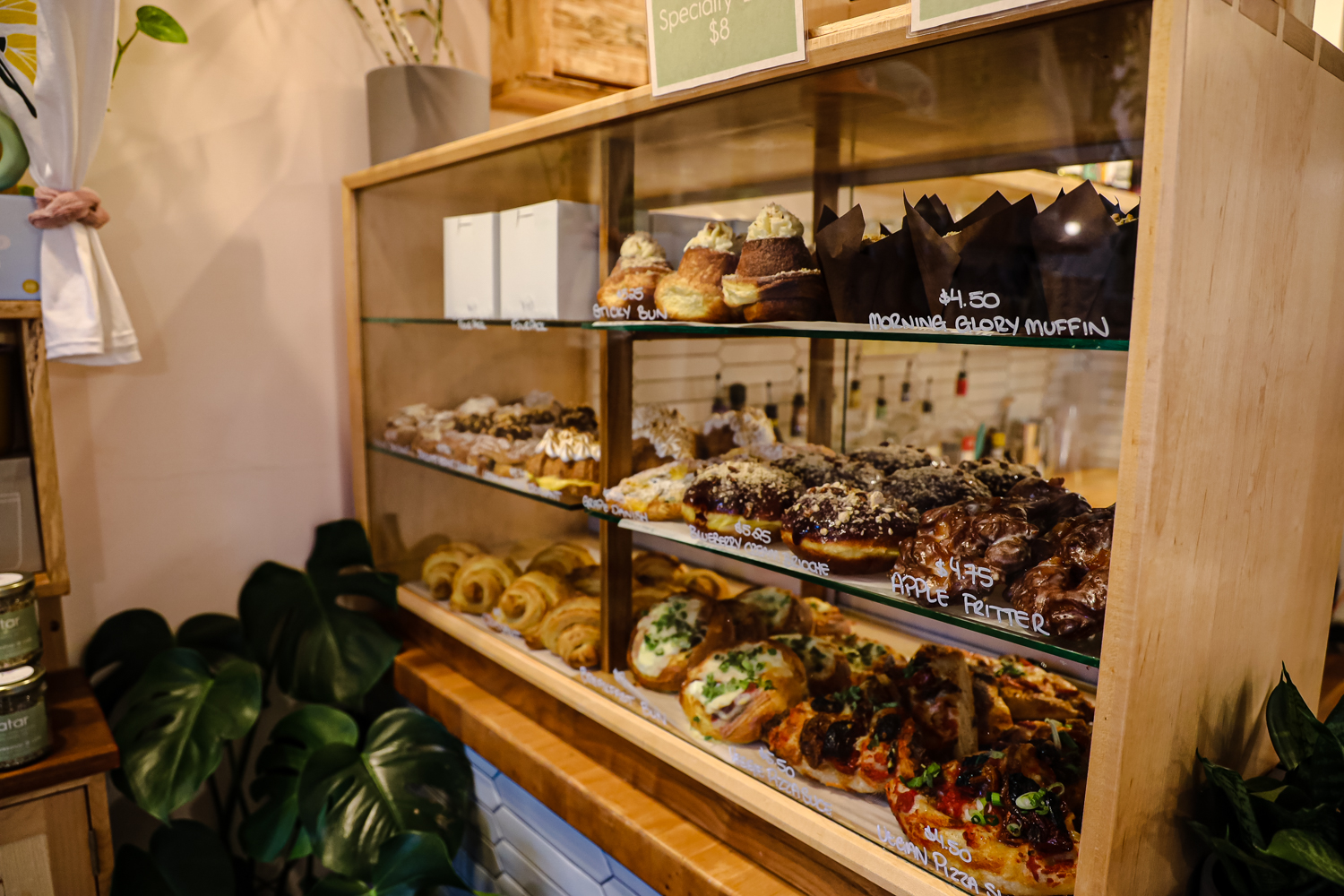 a display case with pastries on it